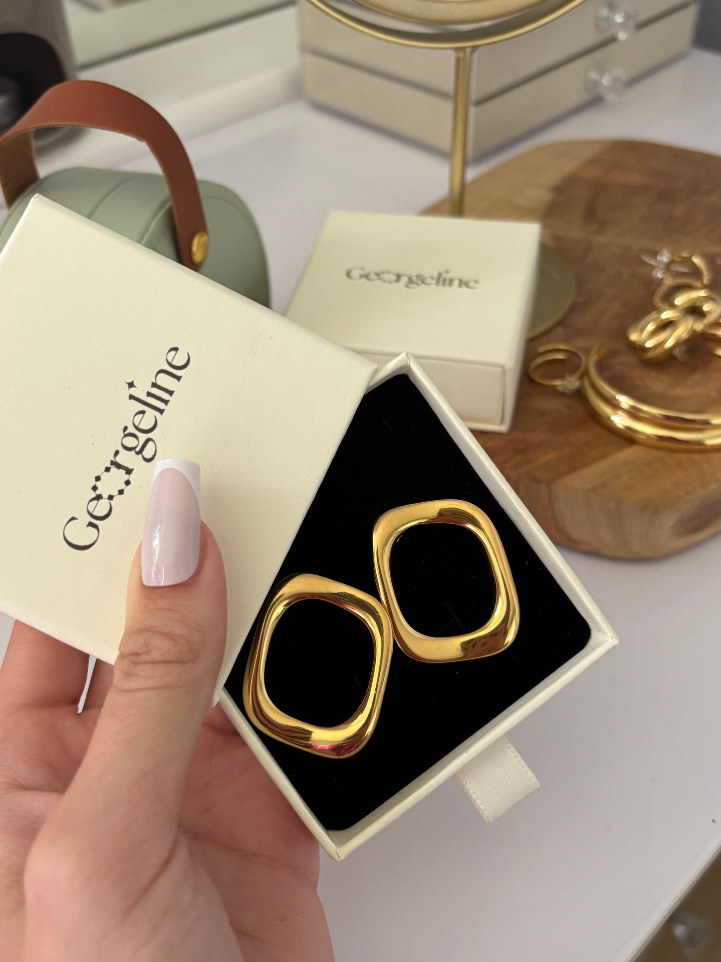 Les boucles d'oreilles Rita